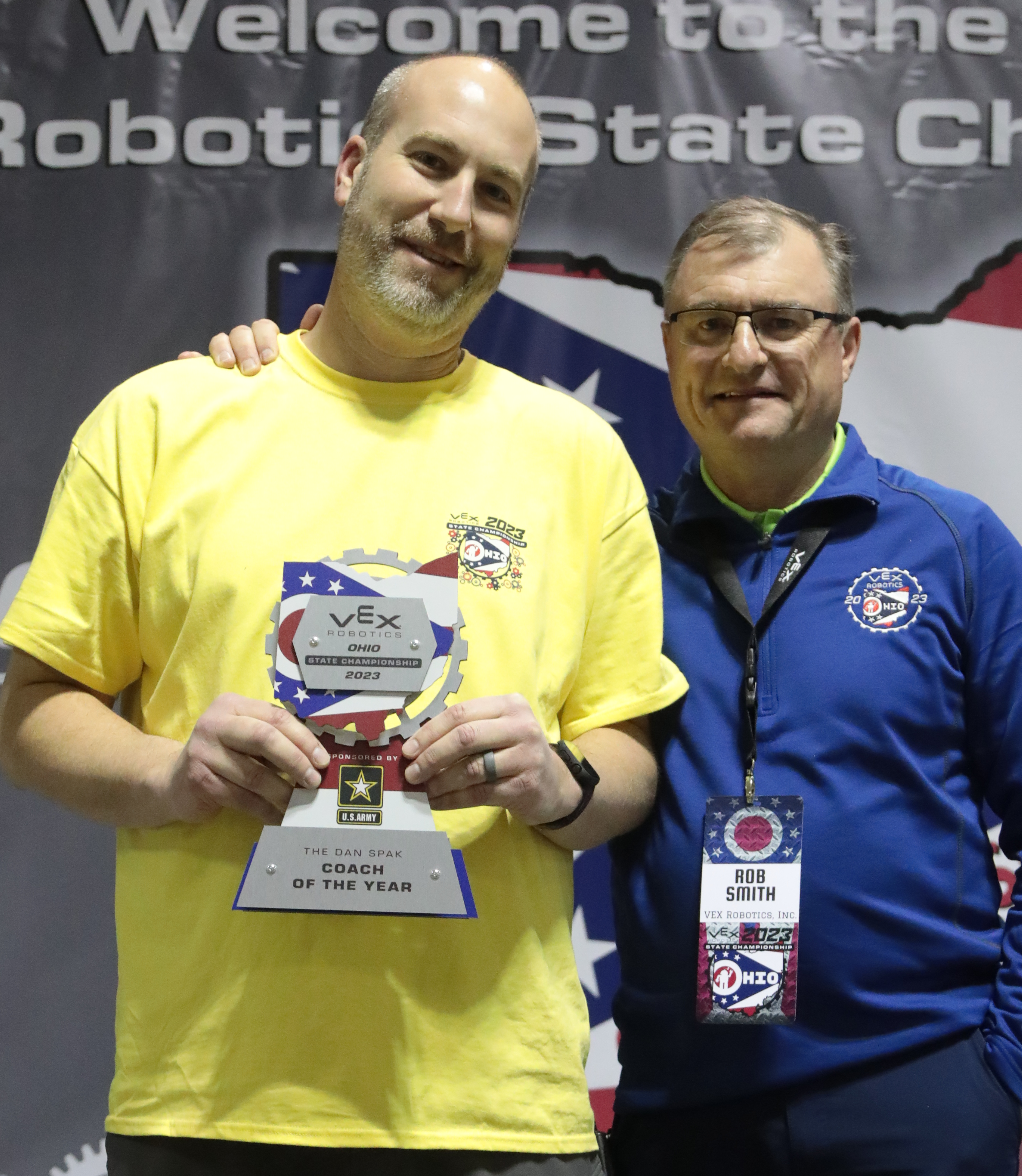 A man receives the Coach of the Year award.
