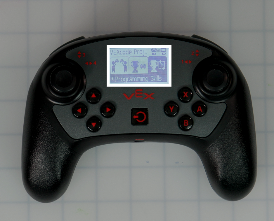The Competition menu showing the Programming skills icon selected and highlighted on the screen.