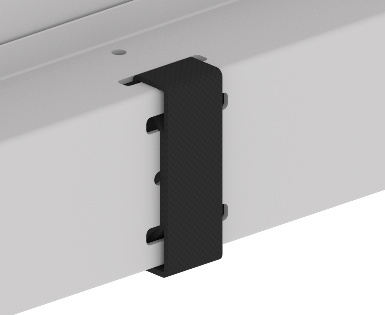 Close up of a finished and secured piece of Velcro on the edge of the Portable Field, which loops back under the field to catch on itself.