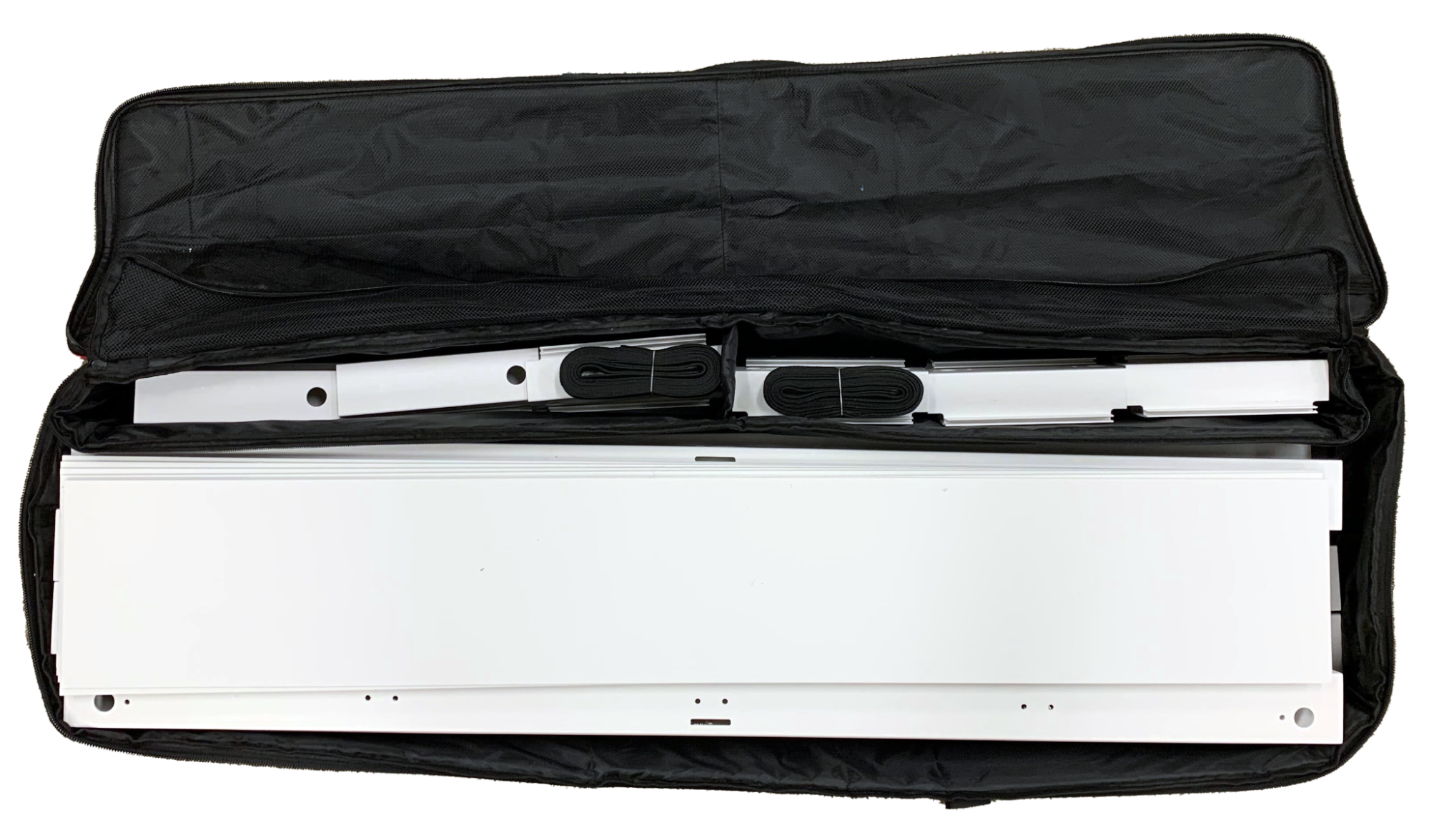 Unzipped and fully packed Field Case 1 is shown with straps placed in each pouch.