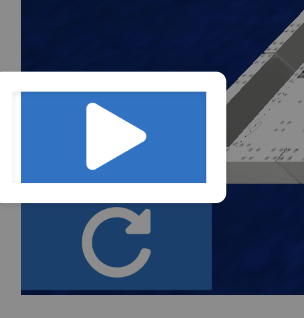 A closeup of the lower left corner of the Driving Skills Practice window with the Play button, showing a rightfacing arrow, highlighted above the reset button. 